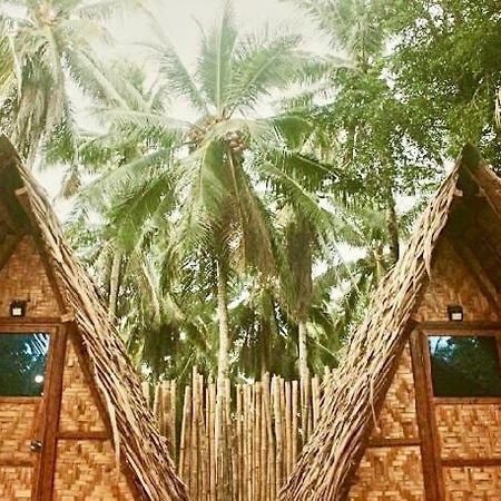 "Triangle Hut" Camp Fuego Siargao Hotel Catangnan Bagian luar foto