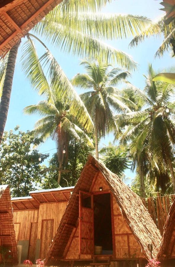 "Triangle Hut" Camp Fuego Siargao Hotel Catangnan Bagian luar foto