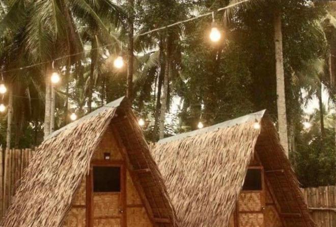 "Triangle Hut" Camp Fuego Siargao Hotel Catangnan Bagian luar foto