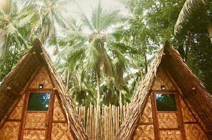 "Triangle Hut" Camp Fuego Siargao Hotel Catangnan Bagian luar foto